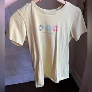 Life Is Good Women’s Tee. Size Small. Small stain on front.